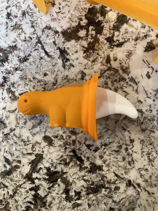 Reviewer image of a popsicle shaped like a dinosaur