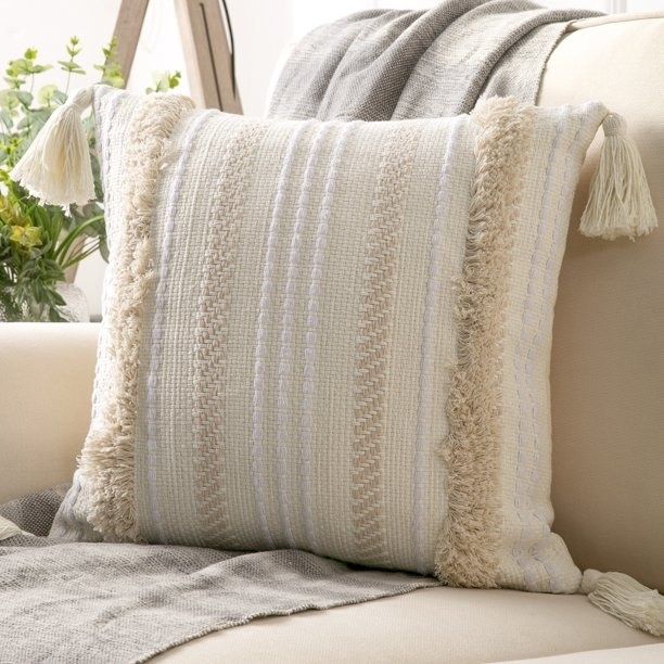 The pillow in a soft cream shade