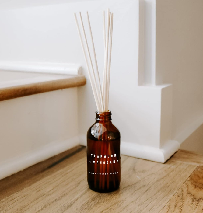 the reed diffuser elegantly placed on a staircase step