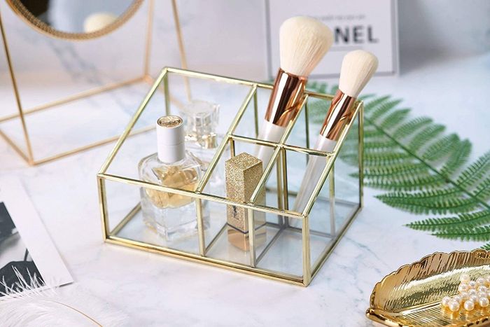 the makeup section with elegant gold accents