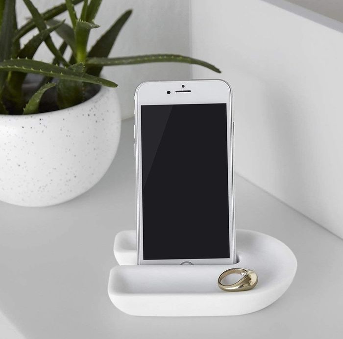 the white countertop tray with an iPhone and ring resting inside