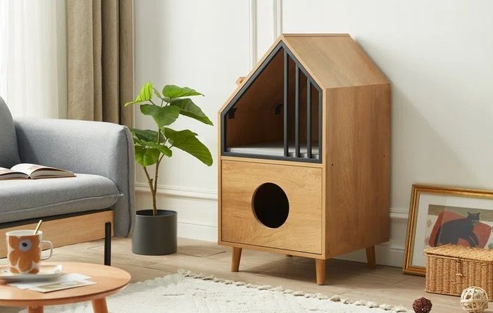 The cat condo, proudly displayed in a family room, offering a modern and elegant pet-friendly feature for the space.