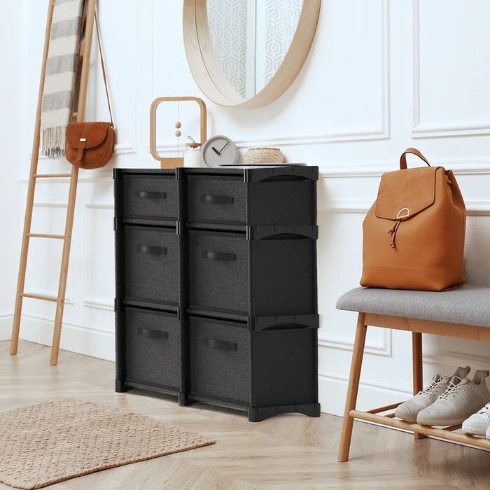 A black organizer placed inside a home, adding both functionality and style.