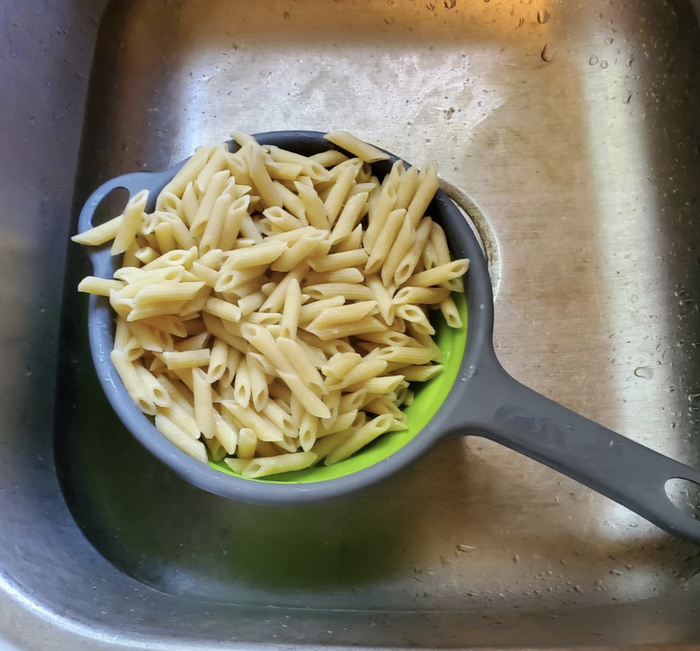 reviewer photo of strainer with pasta inside