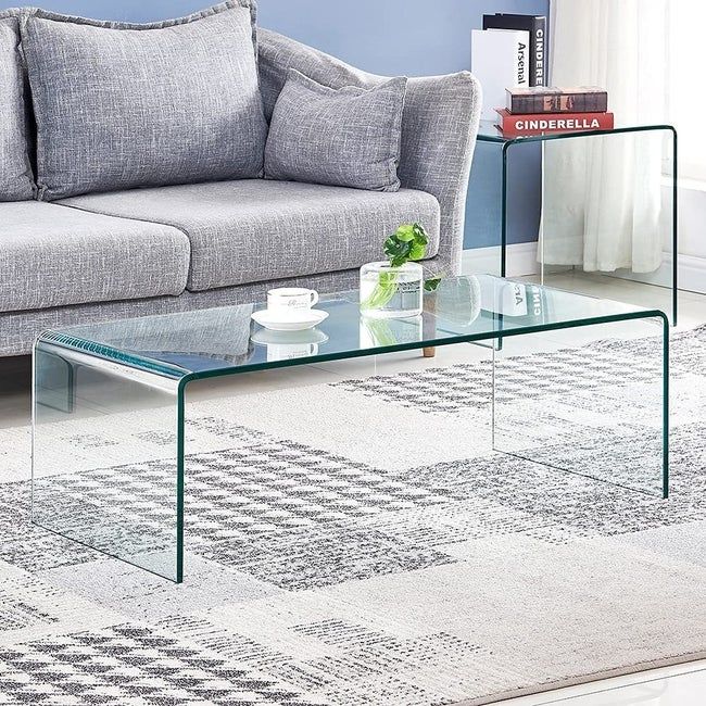 the transparent acrylic coffee table