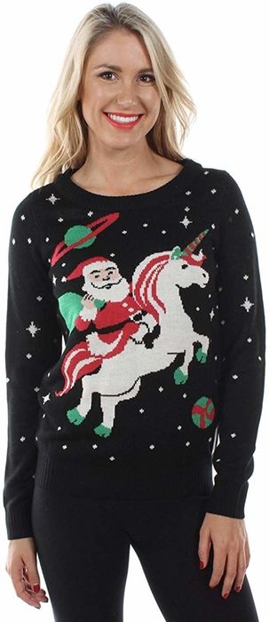 A sweater featuring Santa riding a unicorn through space