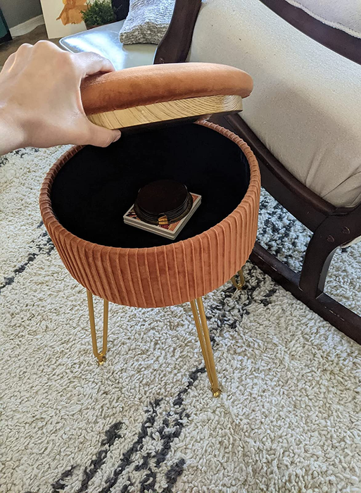 Another reviewer's view showing the storage inside the ottoman