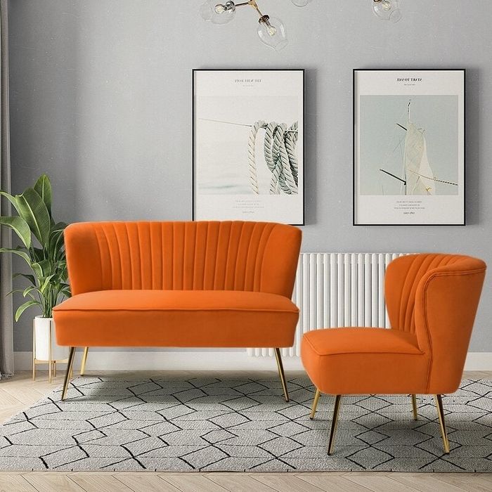 Armless loveseat in vibrant orange velvet
