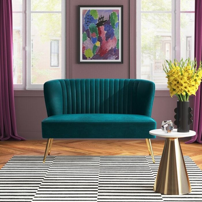 the teal velvet armless loveseat