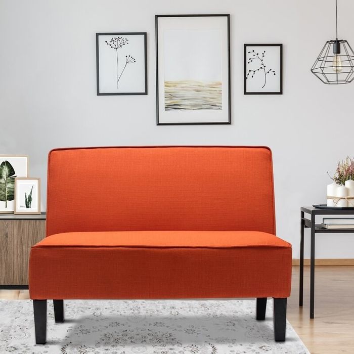 The couch in vibrant orange