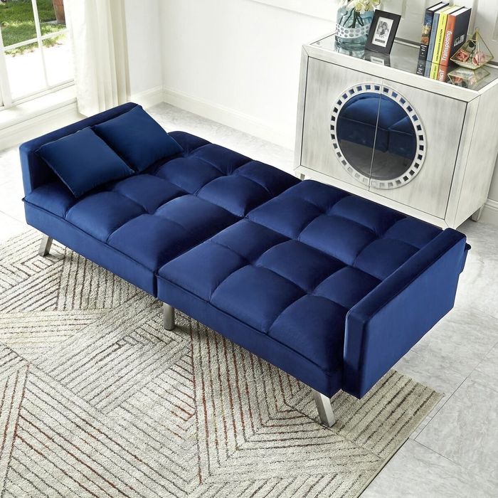 A blue sofa that exudes cool, calming vibes for your space.