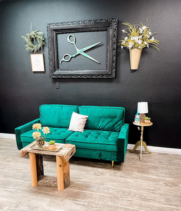 green couch in the reviewer’s living space