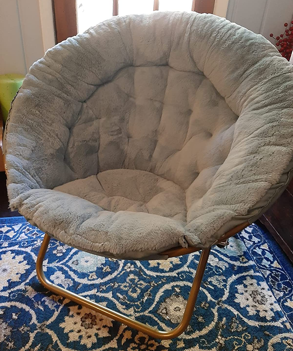 A reviewer’s image showcasing a gray chair.
