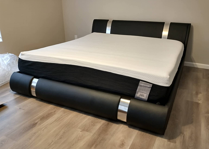 Reviewer's photo of the bed frame in the bedroom