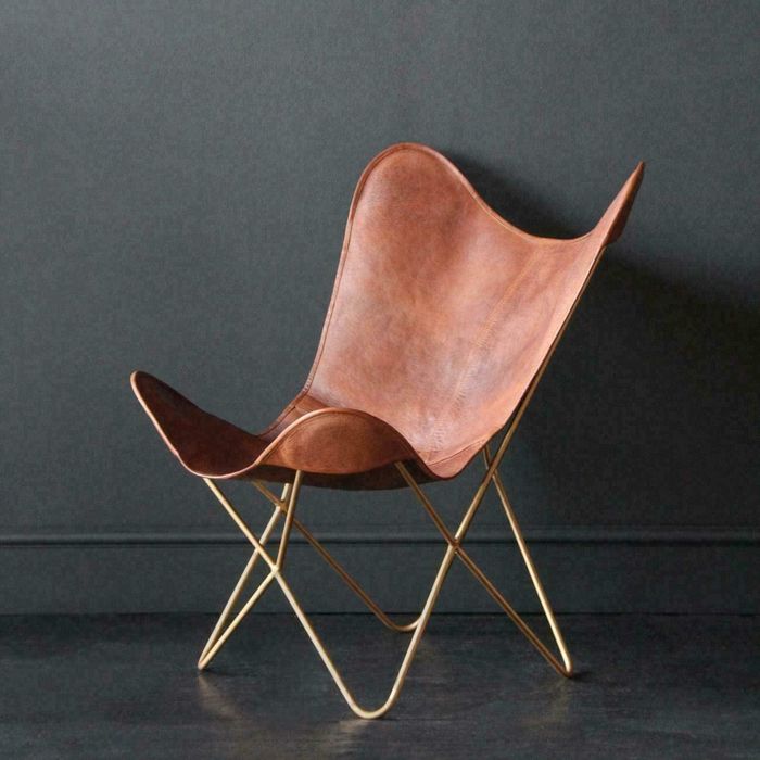 the brown faux leather butterfly chair