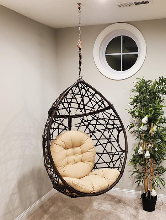 A reviewer's photo showcasing the hanging chair indoors.