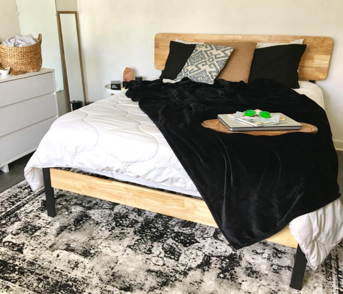 A photo from a reviewer showcasing the Olivia bed in their bedroom