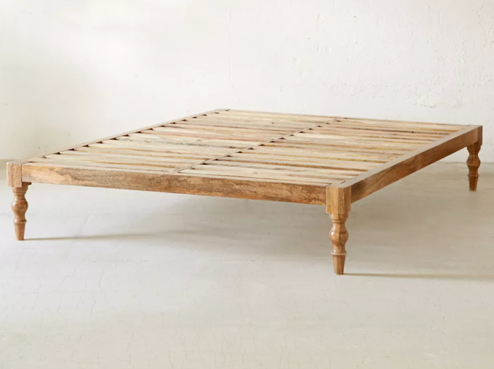 A product image showcasing the rustic wooden bed frame, offering a timeless, sturdy design for your bedroom.