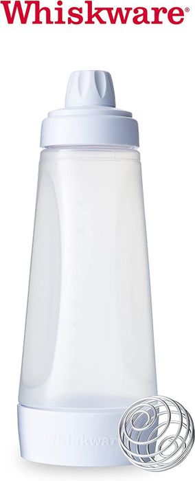 A close-up of the bottle featuring a wire BlenderBall inside