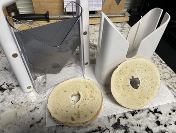 A bagel, perfectly cut in half.