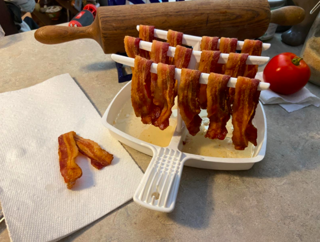 The bacon strips, now crispy and fully cooked.