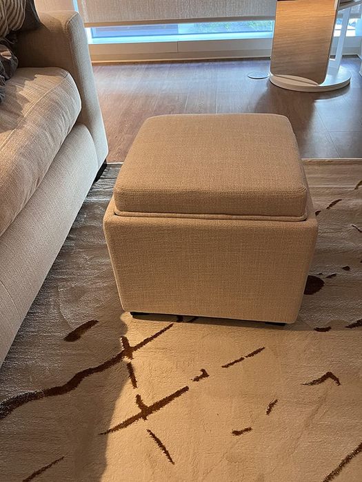 reviewer photo of ivory colored storage cube ottoman
