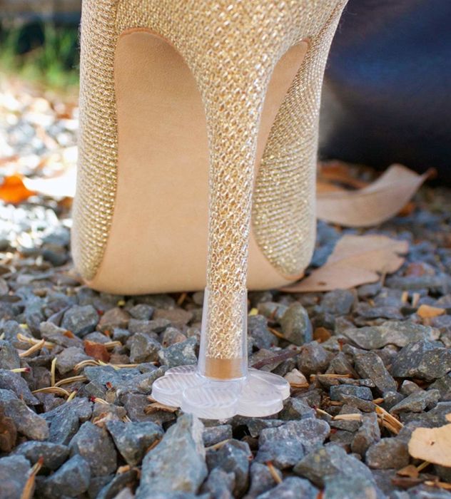 A plastic, flower-shaped cap designed to prevent a stiletto heel from sinking into gravel.