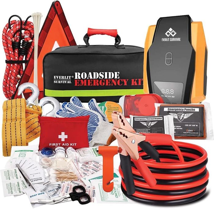 all essentials in the kit, such as jumper cables, safety gloves, and a tire inflator