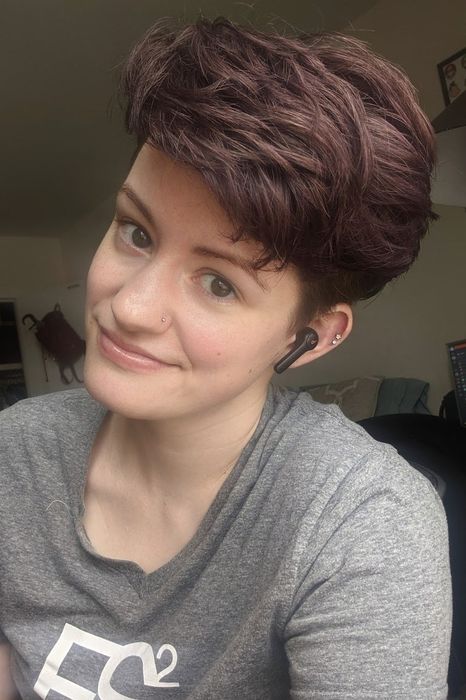 A selfie of a Mytour writer showing their hair dyed purple.