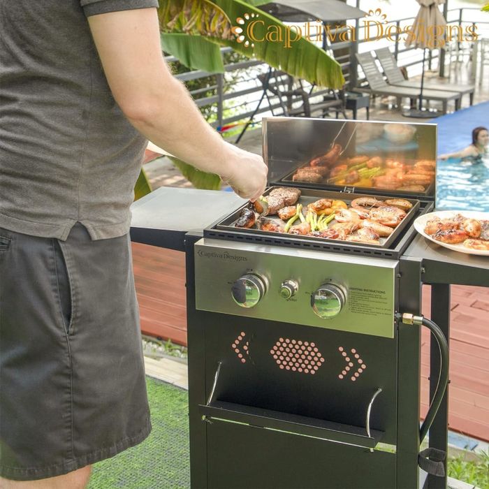Someone grilling food on an outdoor barbecue while others enjoy a relaxing time in the pool behind them.