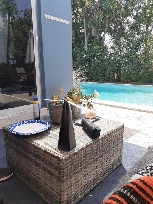 A fan placed on a table, creating a steady breeze.