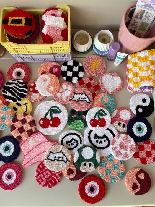 an assortment of car coasters featuring various designs
