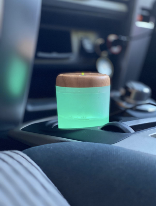 Humidifier glowing green inside the car