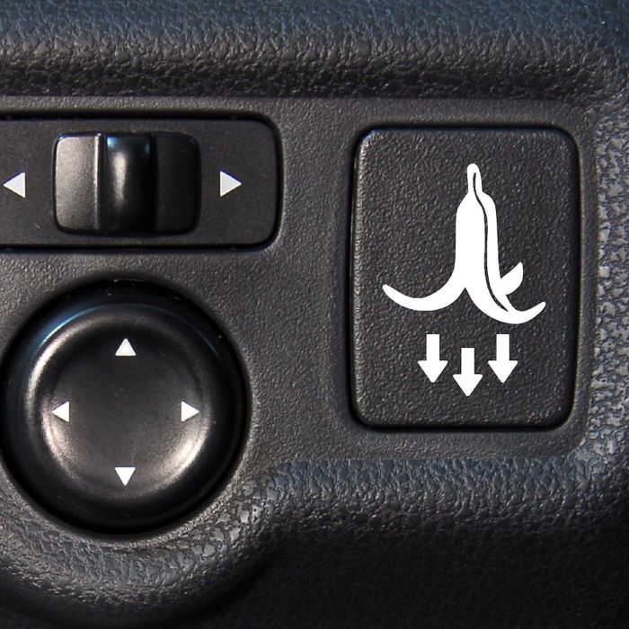 a banana peel decal placed on a button inside the car