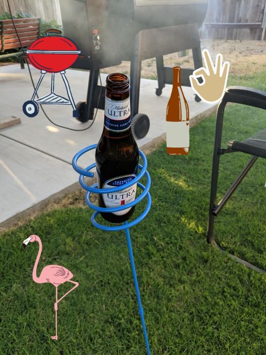 A review featuring a picture of a beer bottle placed on a drink stack.