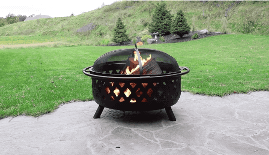 A gif of a fire pit with a blazing fire