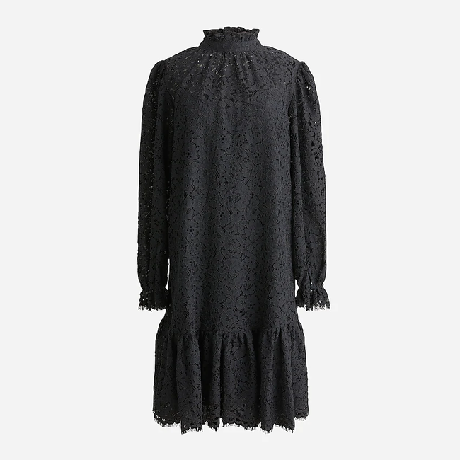 Black lace high-neck dress featuring ruffled hems and sleeves, set against a white background.