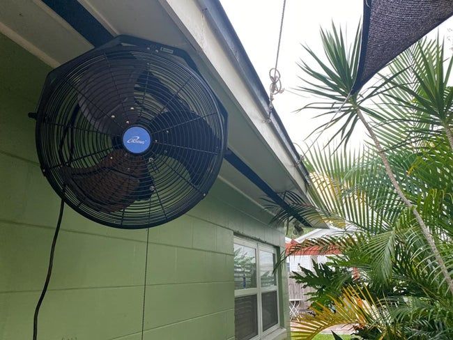 The fan suspended above a patio