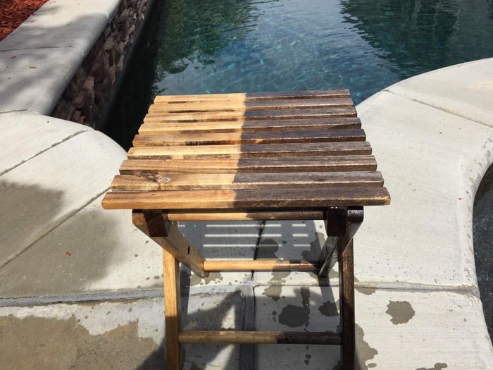 A reviewer's table, partially cleaned using the power washer.