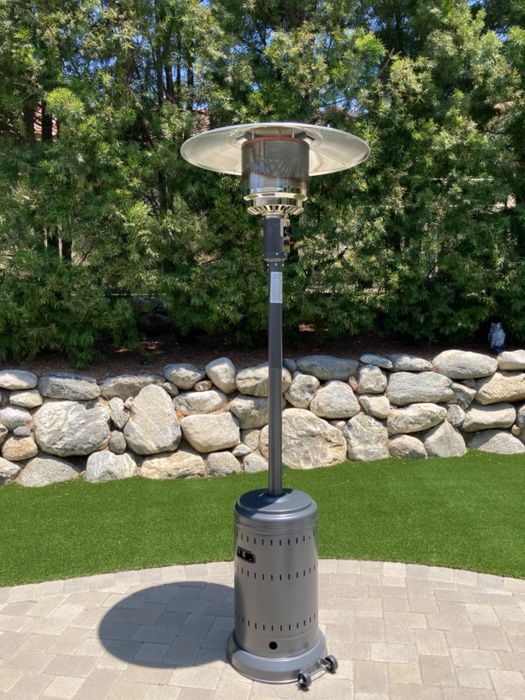 A tall standing heater with a small shade-like top as described by a reviewer.