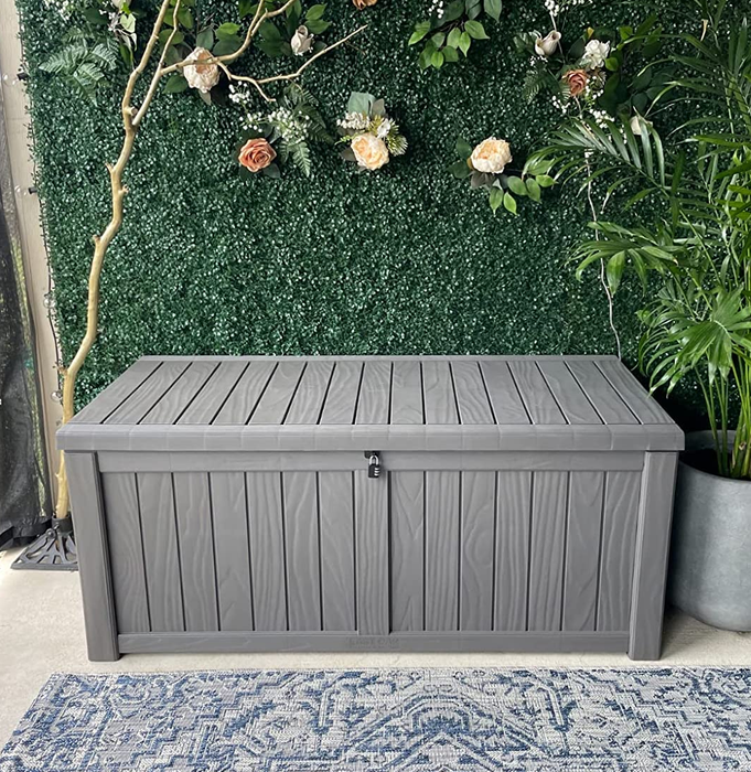 A reviewer’s photo showing a rectangular storage box on a patio.