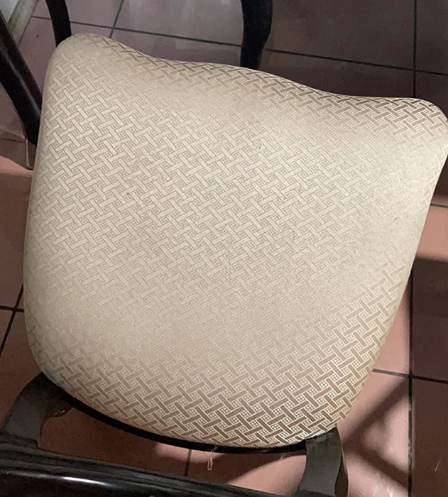 The same reviewer's after photo, showing the beige seat restored to its original condition after being cleaned with the Little Green cleaner