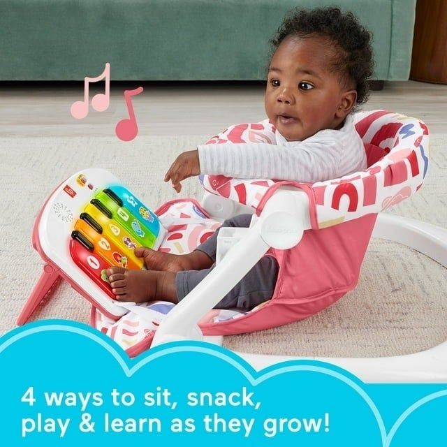 Infant in a multi-use seat with a piano toy, offering both learning and play opportunities.