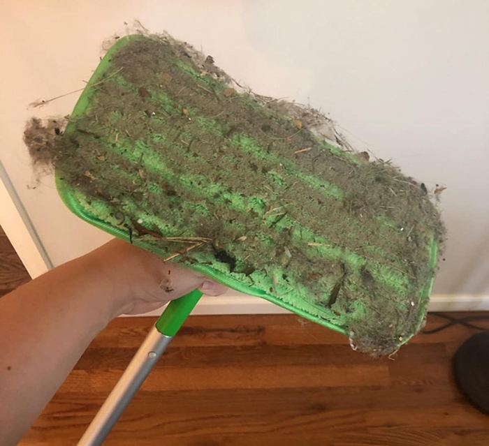 A different reviewer’s mop pad covered in a layer of dust after cleaning