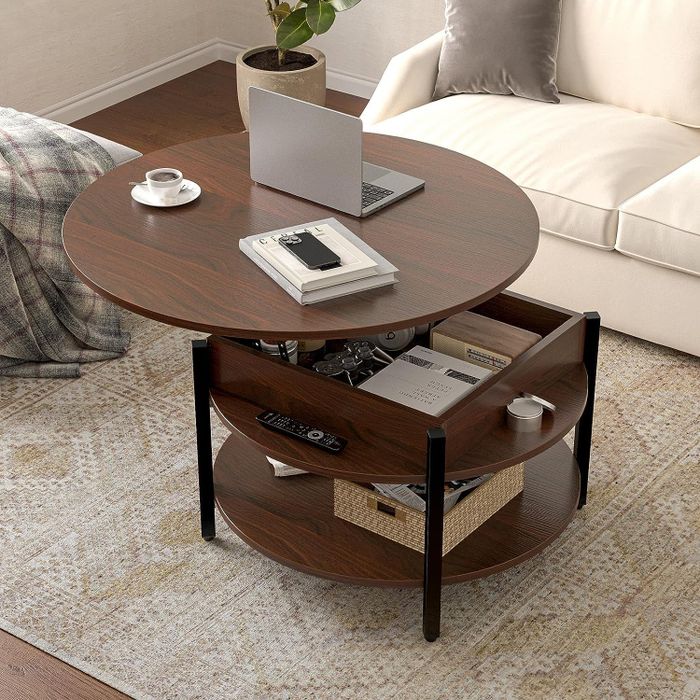 A round table featuring a convenient lift-top for easy access.