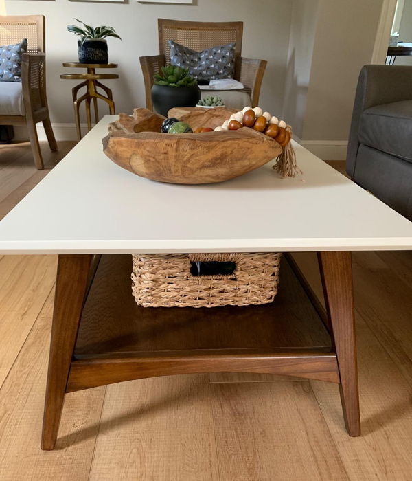 A side view showcasing the table's spacious storage shelf.