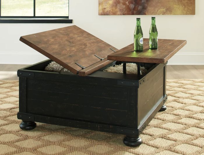 A black coffee table featuring a lift-top design with hidden storage space.