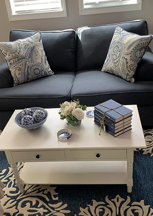 A photo from a reviewer featuring the coffee table in a clean white finish.