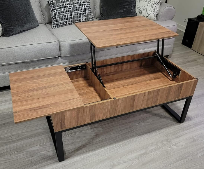 A photo from a reviewer showing the table with both lift-tops raised.