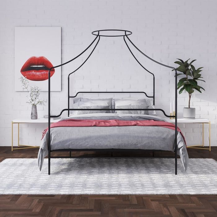 The black metal Camilla Canopy Bed